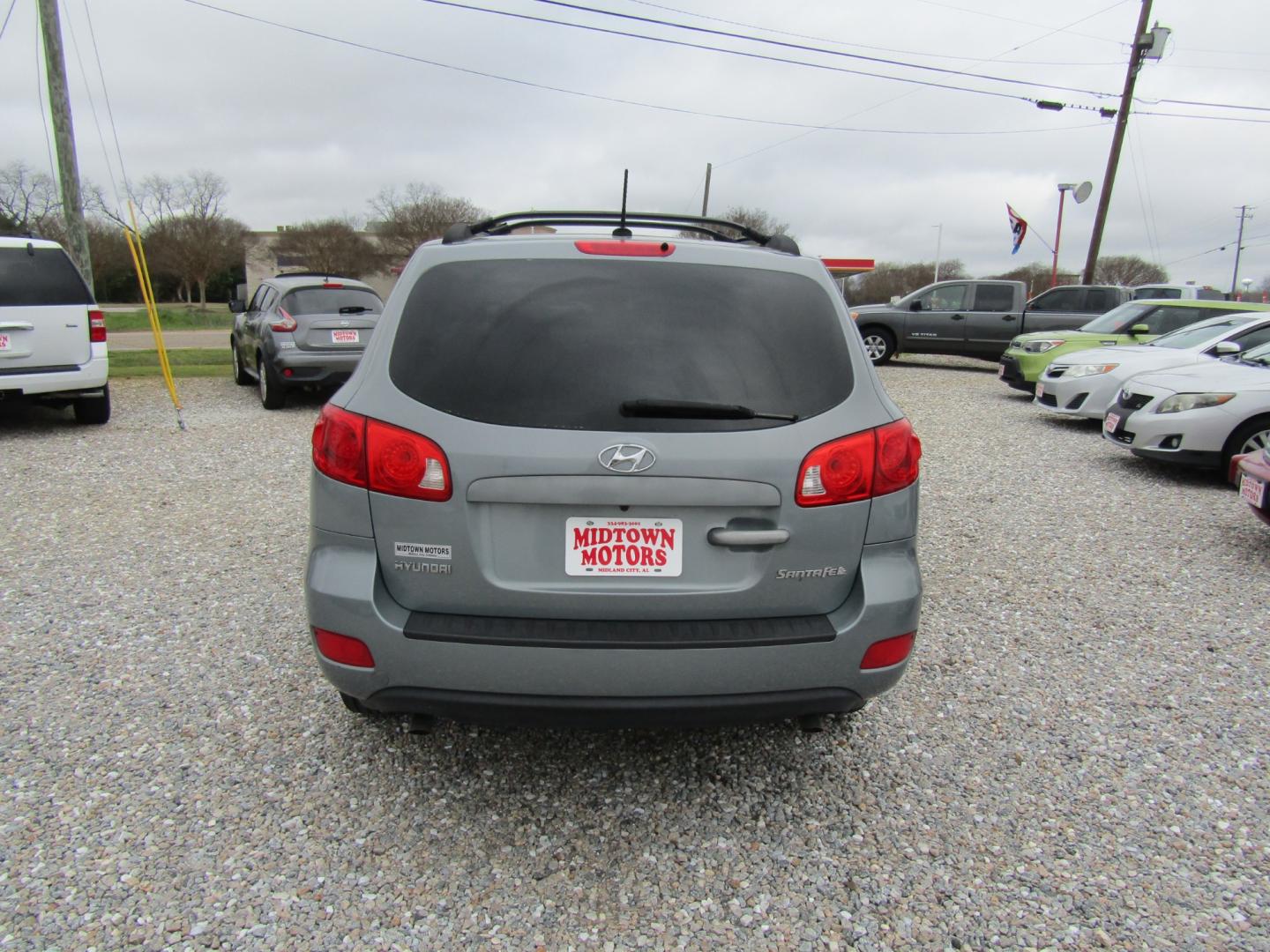 2009 Silver Hyundai Santa Fe GLS (5NMSG13D99H) with an 2.7L V6 DOHC 24V engine, Automatic transmission, located at 15016 S Hwy 231, Midland City, AL, 36350, (334) 983-3001, 31.306210, -85.495277 - Photo#6